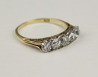An 18ct yellow gold 5 stone mine cut diamond ring, approx. 1.25ct, size N