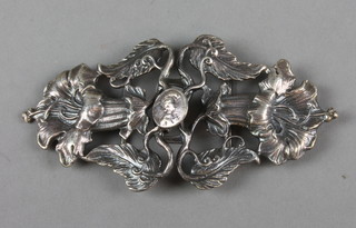 An Art Nouveau style silver buckle decorated with stylised flowers, approx 43 grams
