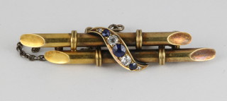 A 15ct diamond and sapphire bar brooch in the form of entwined bamboo shoots, gross weight 6 grams 