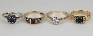 4 9ct gold gem set rings, sizes J, K, L and M 1/2