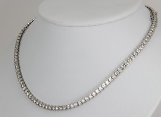 A fine 18ct diamond set tennis necklace, comprising 118 brilliant cut diamonds, each approx. 0.15ct, total  diamonds approx 17.7ct gross weight 32 grams, 