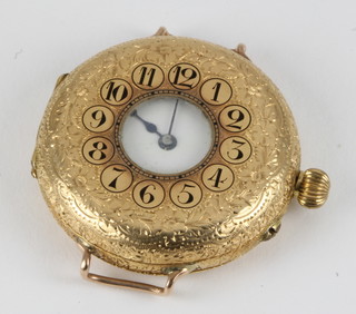 An Edwardian 18ct yellow gold half hunter wristwatch with enamelled numbers