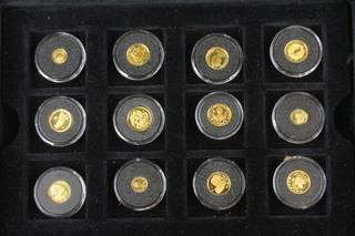 A cased set of 24ct gold "The Smallest Gold Coins of the World Collection", approx. 16 grams