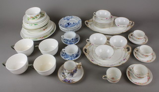 A Victorian tea set comprising 5 cups, 2 saucers, 4 plates, 3 dishes and 4 large plates, 3 other part tea sets