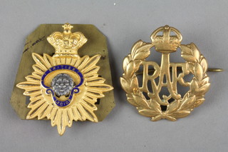 A British Legion cap badge and an RAF ditto 