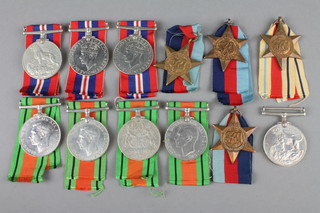 WWII medals.  Defence (4), British War medal (4), 1939-45 (3), Africa (1)
