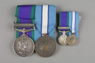 A pair to 24264338 Corporal. I. M. Davies. Rapc. GSM with Northern Ireland bar and UN medal together with miniatures 