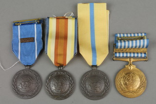 A Greek United Nations medal with Kopea bar, a UN medal with Congo bar and 2 others