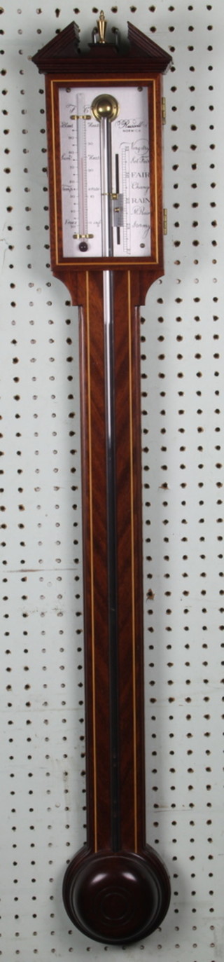 Russell of Norwich.  A 20th Century Georgian style mercury stick barometer with silvered indicator, contained in an inlaid mahogany case 