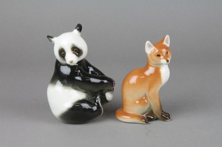 A Russian figure of a seated Panda 5" and a ditto fox 4 1/2" 