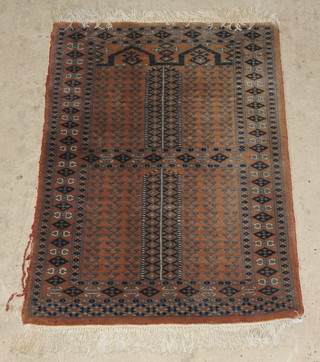 A cream ground and Bokhara rug with all-over geometric design 39" x 24" 