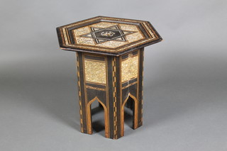 A Moorish octagonal occasional table inlaid mother of pearl 19"h x 22"w  