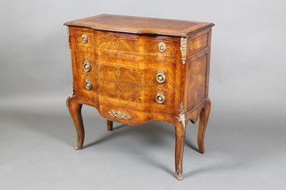 A 19th Century French walnut Kingwood & crossbanded commode of serpentine outline fitted 3 long drawers and with gilt metal mounts 33"h x 31"w x 17"d 