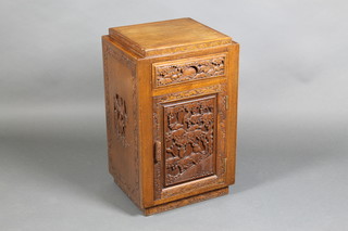 A 1930's Chinese carved camphor bedside cabinet 26"h x 13"w x 16"d 