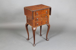 A 1920's Queen Anne style walnut drop flap bedside table fitted 3 long drawers, raised on cabriole supports 29"h x 16"w x 12"d, when opened x 27 1/2"w