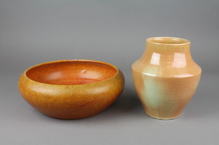 An orange glazed Dicker Ware shallow bowl 10" and a ditto oviform vase 7" 