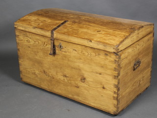 A 19th Century Continental domed pine trunk with iron drop handles 23 1/2"h x 38 1/2"w x 21"d 