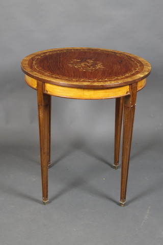 A circular inlaid mahogany occasional table with crossbanded top and inlaid floral decoration, raised on square tapering supports 29"h x 27" diam.