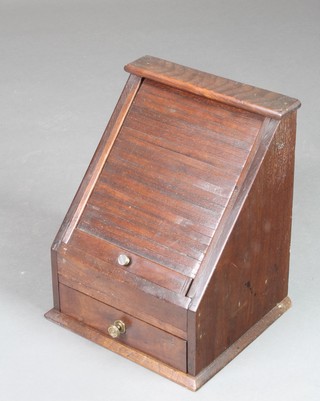 An Edwardian wedge shaped mahogany stationery box with tambour shutter, the base fitted a drawer 12 1/2"h x 10"w x 9 1/2"d 