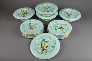 A Victorian dessert service, the turquoise ground decorated with birds among flowers, comprising 12 dessert plates and 4 tazzas