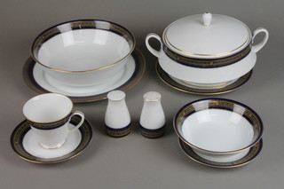 A Noritake tea and dinner service no.P529 comprising 10 tea cups, 11 saucers, 8 dessert bowls, 10 side plates, 11 dinner plates, 10 soup bowls, a tureen and cover, a salad bowl, a salt and pepper, sauce boat and meat plate 