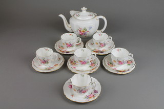 A Royal Crown Derby, Derby Posies tea set comprising 6 tea cups, 5 saucers, teapot and 6 sandwich plates 