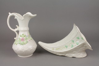 A late Belleek cornucopia vase 11" and a ditto waisted jug 