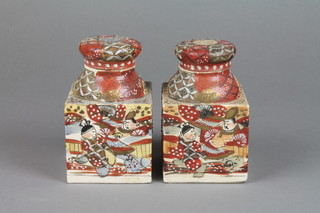 A pair of late Satsuma square tea caddies and covers decorated with figures in pavilions 5" 