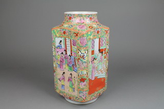 A 20th Century famille rose style 4 sided vase decorated with figures in pavilion landscapes 14" 