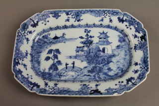 An 18th Century Chinese blue and white octagonal meat plate decorated with an extensive landscape and figures 10" 