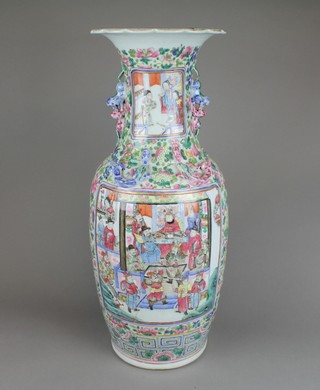 A 19th Century famille rose vase with lion handles and fluted lip, the floral ground with panels of figures at pursuits in pavilion interiors 24"h 