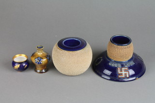A Royal Doulton match holder striker 5", a ditto bulbous match striker holder 4", a ditto baluster vase 3" and a blue and gilt pot 
