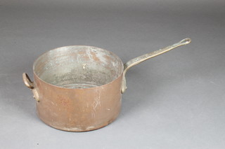 Leon Jaeggi & Sons, a large copper saucepan with brass handle 13" 