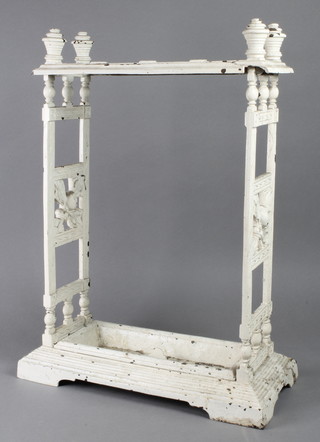 A Victorian white painted 4 division umbrella stand 25"h x 17"w x 6"d 