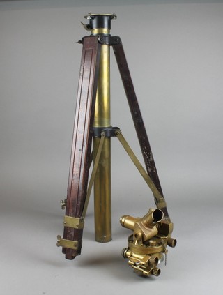 A dumpy level marked Director C no.7C Mk II REL Canada 1944 790-C together with an associated and later mahogany and brass tripod  