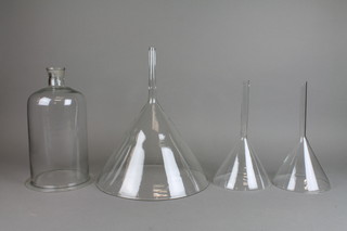 3 graduated glass funnels 12", 6" and 6" together with a glass bell jar 12"