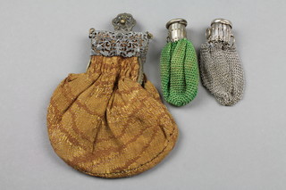 A chain mail purse, 1 other and a purse with pierced metal mounts 