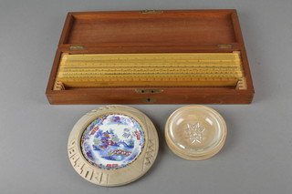 8 wooden Drawing Office supplies Ltd rulers together with a Stanley wooden ruler contained in a fitted box, 2 circular carved wooden butter dishes with glass and ceramic liners
