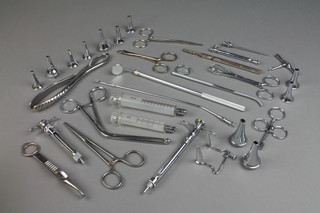 A collection of various 20th Century stainless steel medical instruments