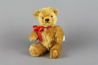 A Deans brown mohair bear with articulated limbs 10" 