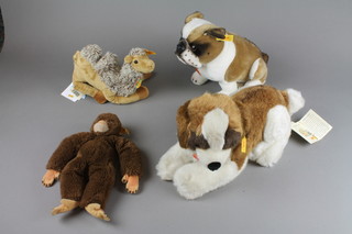 A Steiff figure of a seated dog - Bernie 14", ditto seated bulldog - Snobby 9", 1 other 11" and a Cosy friend camel 10",=