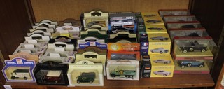 9 Atlas Edition models of classic sports cars, 10 Coachbox models of Yesteryear and various other toy cars, boxed 