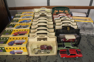 6 Vanguard model commercial vehicles and a collection of other model cars