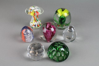 7 modern paperweights including faceted, end of day and stylised flowers