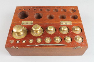 Barid & Tatlock, a set of 14 weights contained in a mahogany box 