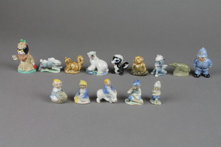14 Wade figures comprising - laughing policeman, a cat dressed in a coat a pig riding gnome, a polar bear, an elf on an acorn, a skunk, a squirrel, an elf with a  prospecting pan, a cartoon pegasus, monkey, an elf, a badger and a crossed legged elf