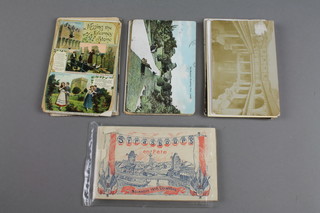 A pack of 22 unused postcards of 1918 celebrations in Strasbourg together with 40 1904 - 1914 used postcards 