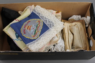 A Victorian black bead work bonnet, a white cotton bonnet, a lady's evening bag, a WWI embroidered doily decorated the badge of the Queens Regt., 4 WWII silk embroidered handkerchiefs decorated badges of the Royal Artillery, Fleet Air Arm and 2 Pioneer Corps