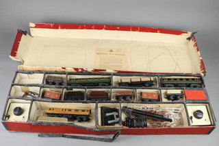 A TTR electric train set comprising 2 14 volt controllers, 3 carriages, 2 tenders, 5 wagons and 2 buffer stoppers etc, boxed 