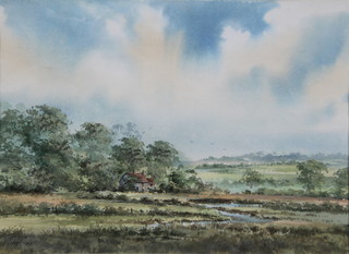 Terry Evans, watercolour, a rural study of farm buildings beside a river, signed 10" x 14" 